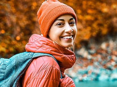 Woman smiling in the woods