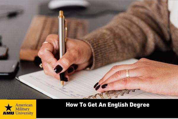 English degree student writing in notebook