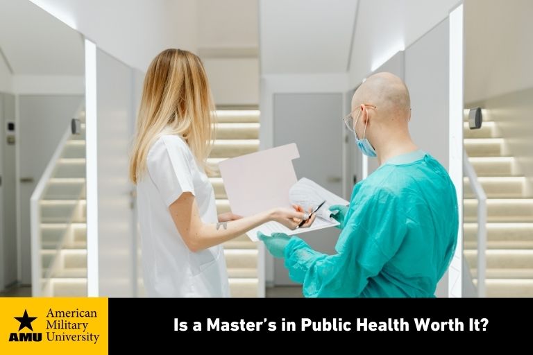 is-a-masters-in-public-health-worth-it public health workers looking at medical chart