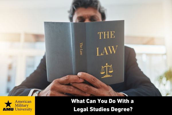 legal studies degree student reading textbook