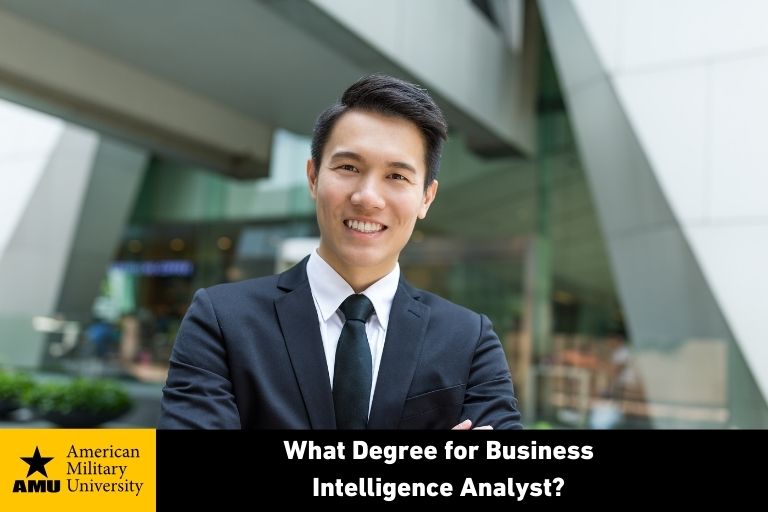 business intelligence analyst standing in front of corporate building