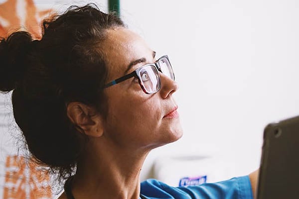 Woman Looking at Chart